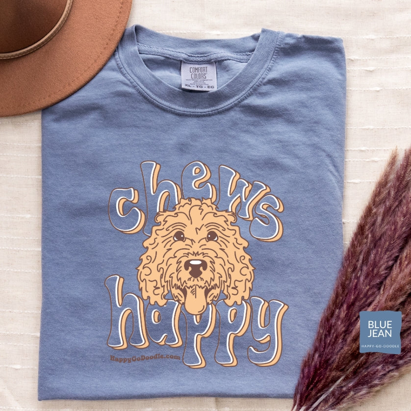 Goldendoodle comfort colors t-shirt with Goldendoodle face and words "Chews Happy" in blue jean color