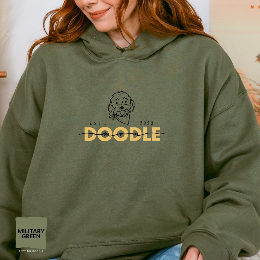 Goldendoodle Mom Hoodie with Goldendoodle face and words "Doodle Mom Est 2023" in military green color