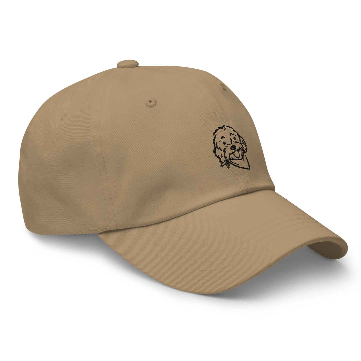 Side view of Doodle dog hat with embroidered Doodle dog's happy face on the front of the unstructured, 6-panel, low-profile baseball style cap in khaki color with the Doodle dog face in black embroidery