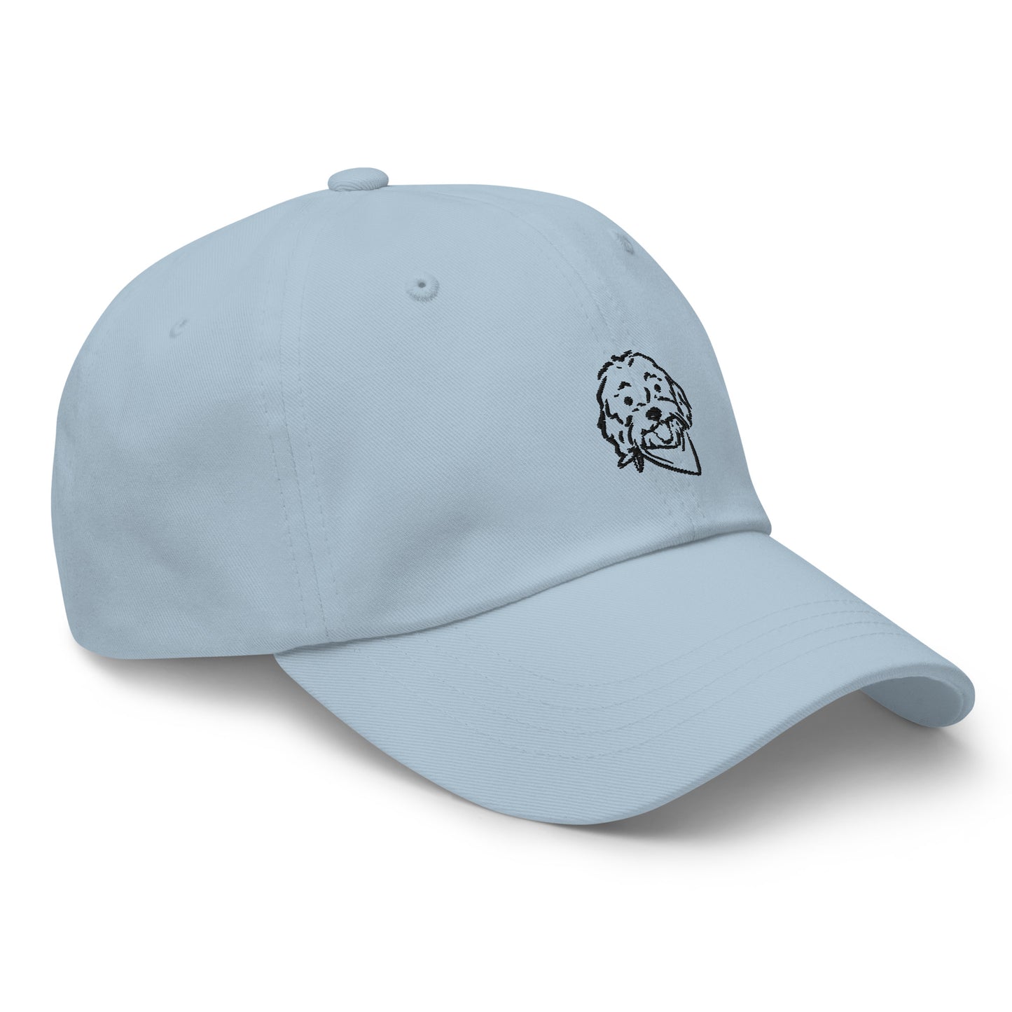 Side view of Doodle dog hat with embroidered Goldendoodle dog's happy face on the front of the unstructured, 6-panel, low-profile light-blue baseball style cap