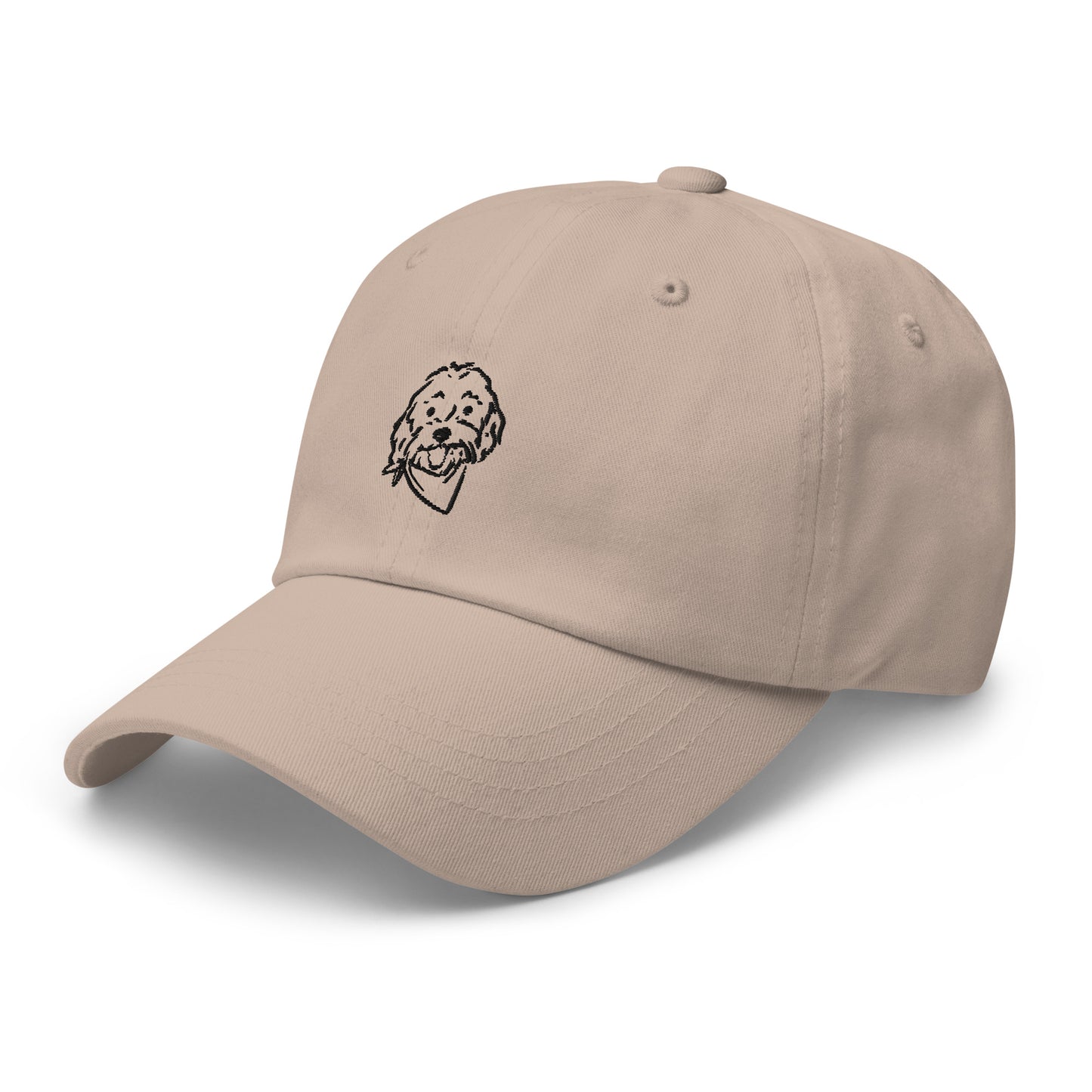 Three-quarter view of Goldendoodle hat with embroidered Doodle dog's happy face on the front of the unstructured, 6-panel, low-profile style ball cap in stone color with black embroidery