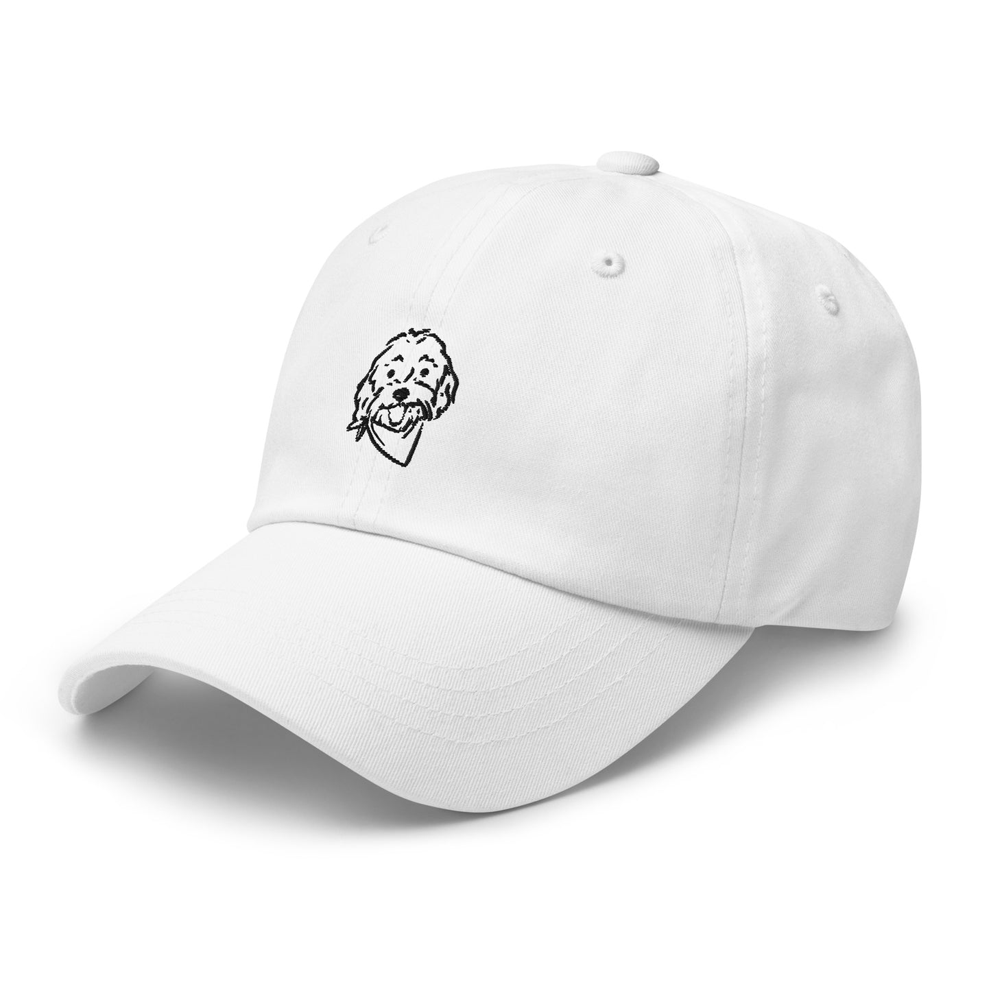 Three quarter view of Goldendoodle dog hat with embroidered Doodle dog's face on the front of the unstructured, 6-panel, low-profile baseball style cap in white with black embroidery of Goldendoodle's happy face