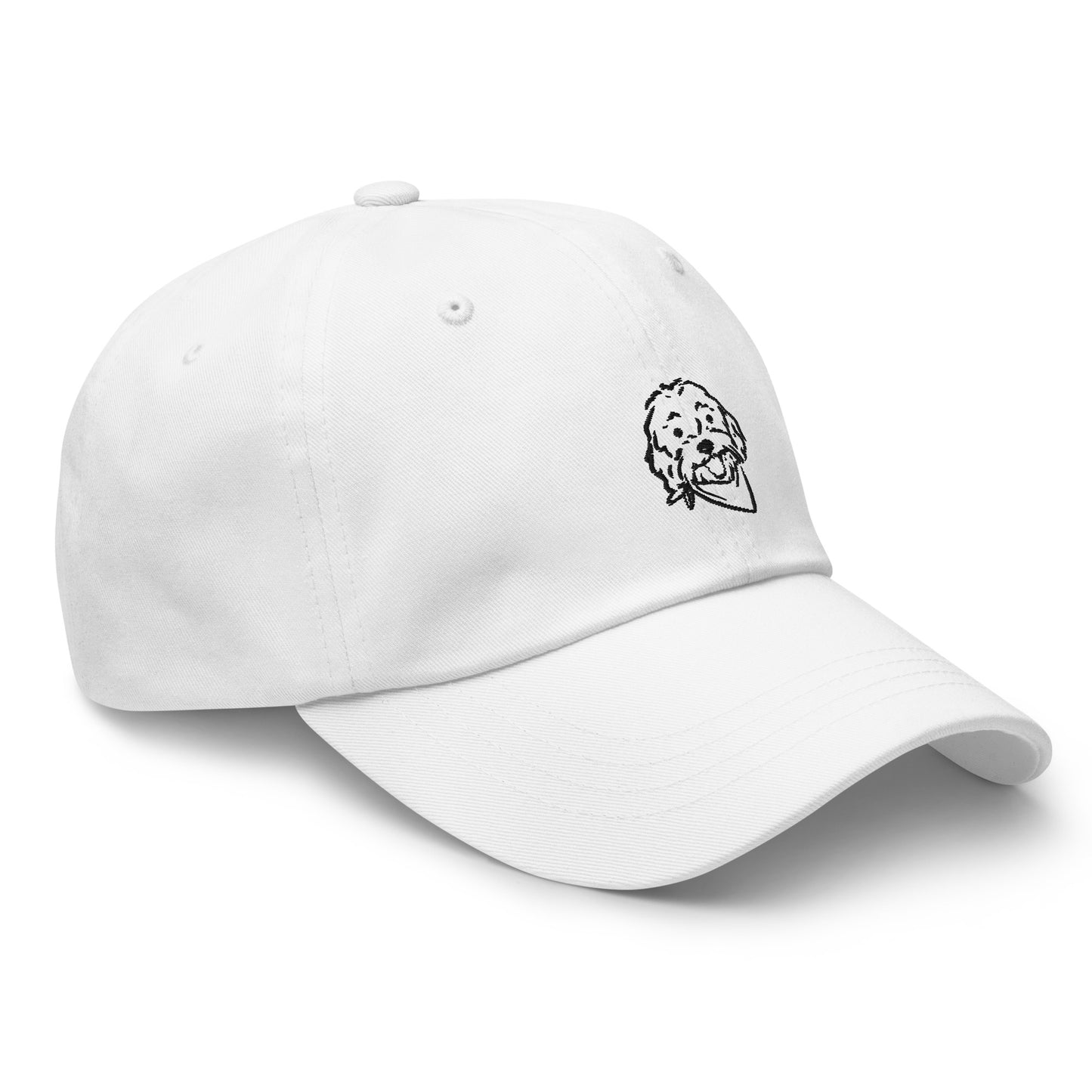 Side view of Doodle dog hat with embroidered Goldendoodle dog's face on the front of the unstructured, 6-panel, low-profile baseball style white cap with black embroidery of Doodle's dog's happy face