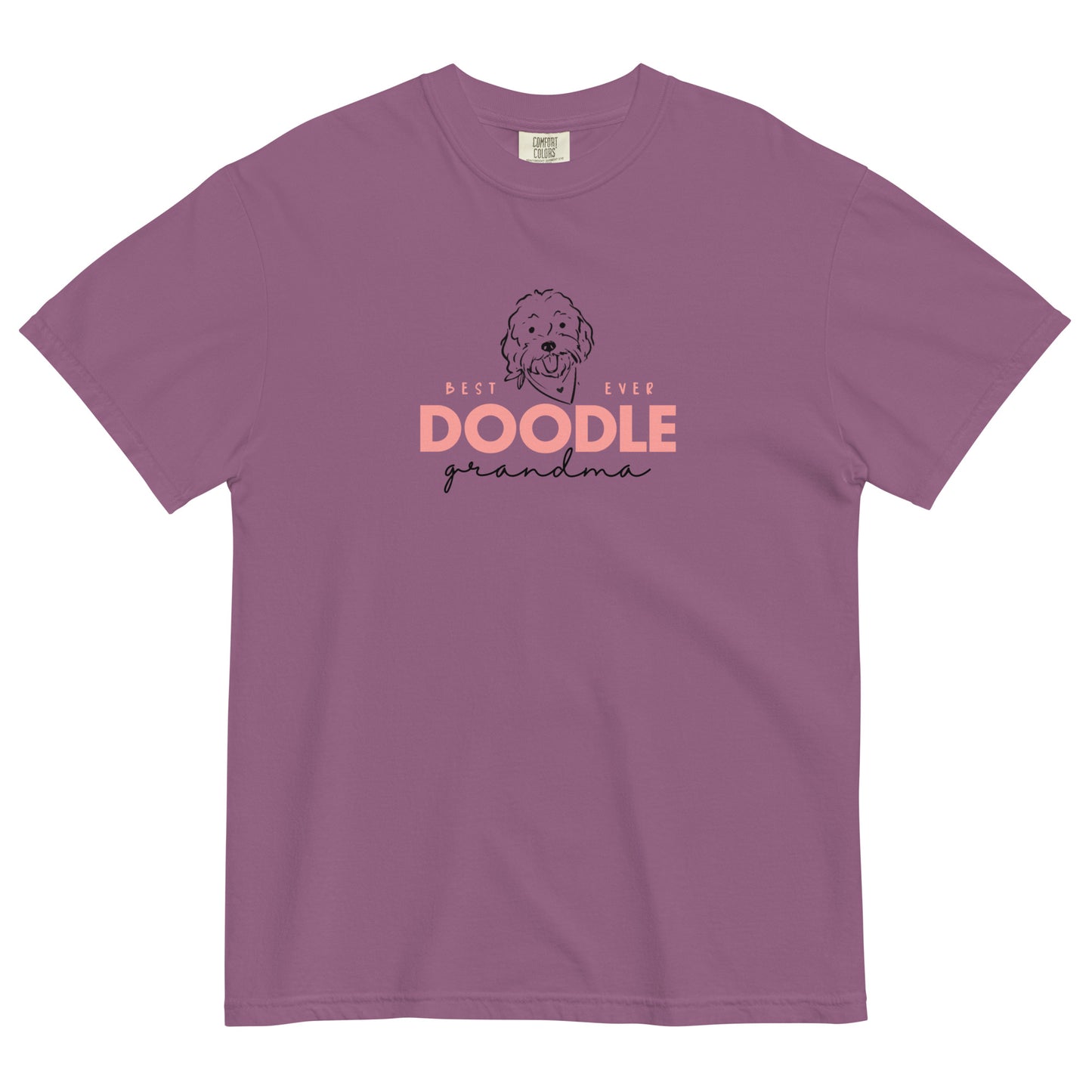 Best EVER DOODLE Grandma message printed in a soft pink and black colors with a cute Doodle dog's face printed on the front of a cozy T-Shirt that's berry colored. The tag inside the Goldendoodle Grandma T-shirt says Comfort Colors