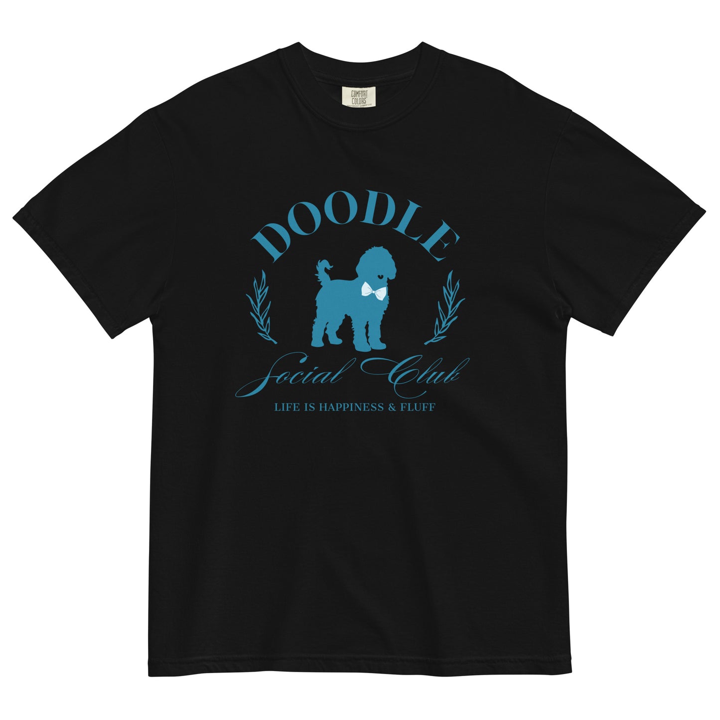 This Doodle Mom shirt displays the words, "Doodle Social Club" and the tag line "Live Like You're a Doodle Dog" below a graphic of a Doodle dog wearing a blue bow tie. The design is printed in light blue on the front of a black Comfort Colors short-sleeve shirt.