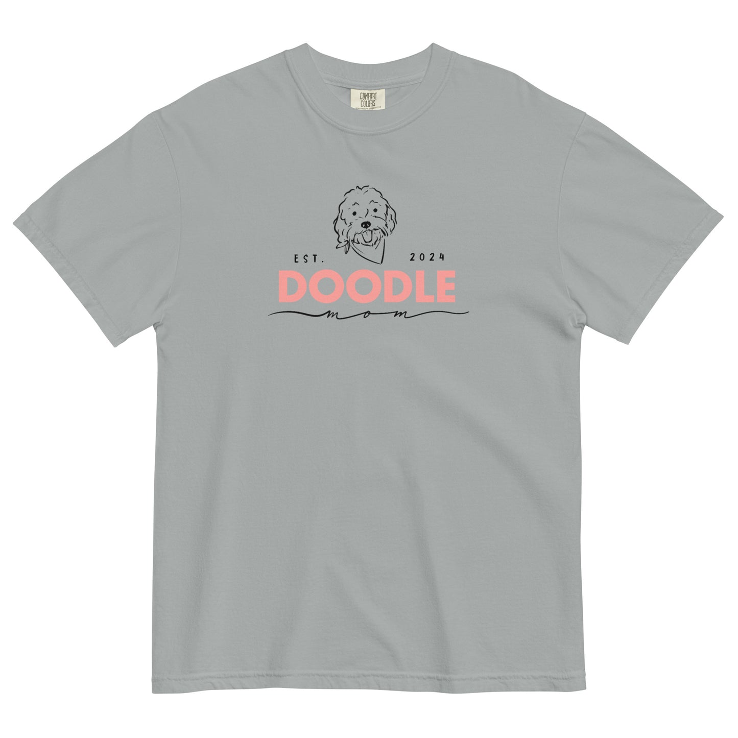 This Doodle Mom shirt features the message, "Doodle Mom Est. 2024" with a cute Doodle dog's face printed on the front of a cozy T-Shirt. The tag inside the shirt says Comfort Colors