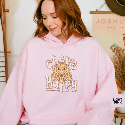Goldendoodle hoodie with Goldendoodle face and words "Chews Happy" in light pink  color