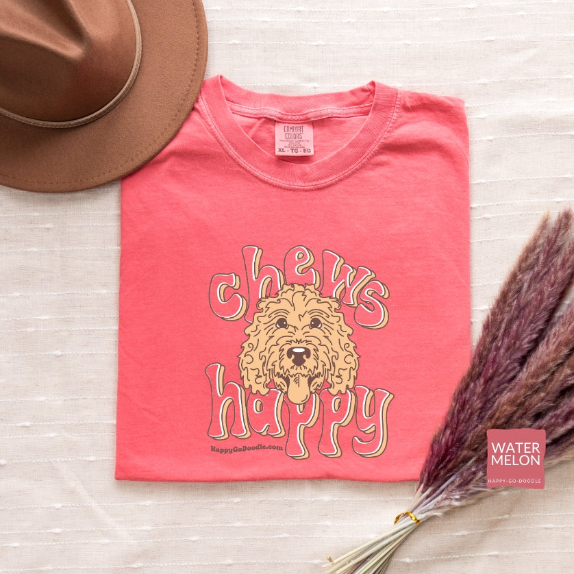 Goldendoodle comfort colors t-shirt with Goldendoodle face and words "Chews Happy" in watermelon color
