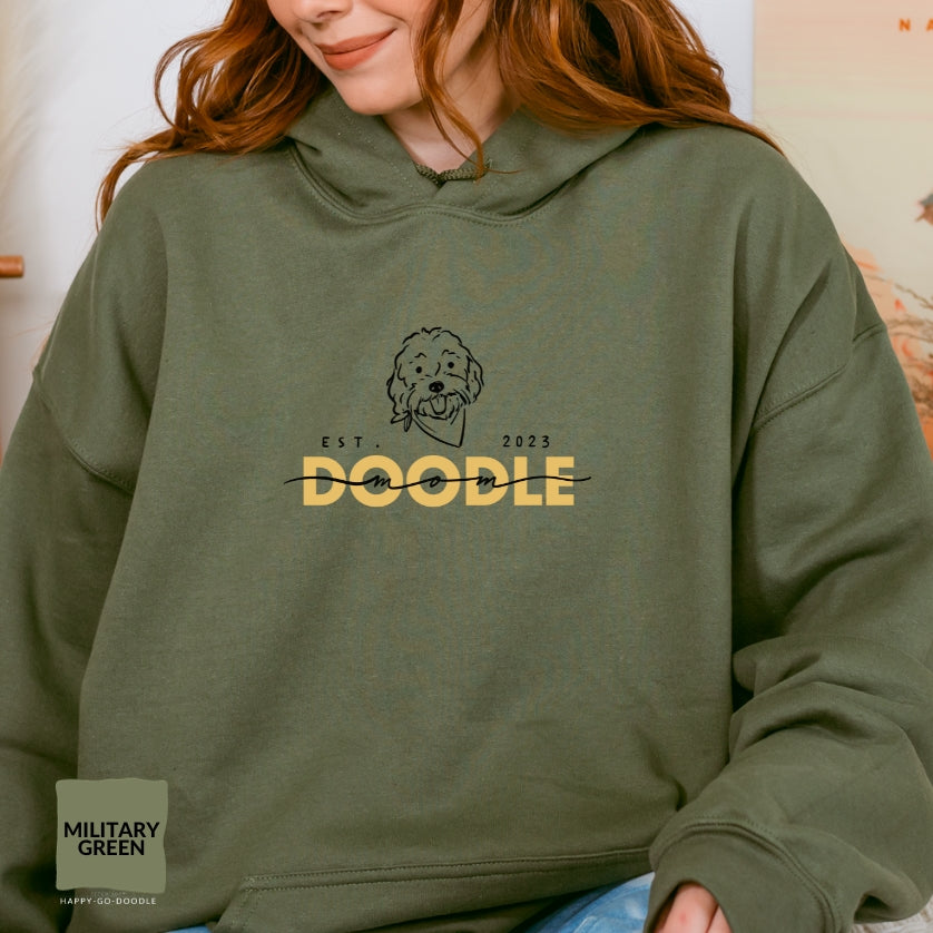 Goldendoodle Mom Hoodie with Goldendoodle face and words "Doodle Mom Est 2023" in military green  color