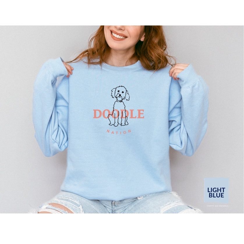 Goldendoodle crew neck sweatshirt with Goldendoodle and words "Doodle Nation" in light blue color