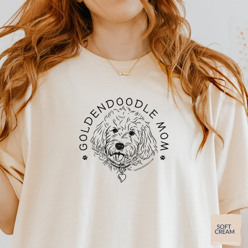 Goldendoodle Mom t-shirt with Goldendoodle face and words "Goldendoodle Mom" in soft cream color