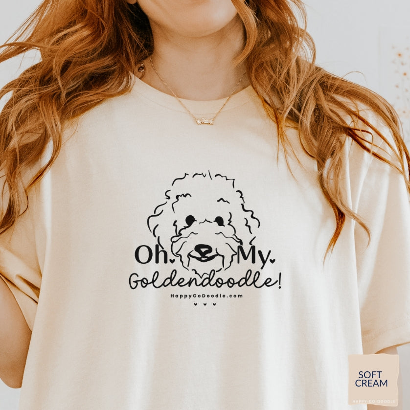 Goldendoodle t-shirt with Goldendoodle face and words "Oh My Goldendoodle" in soft cream color