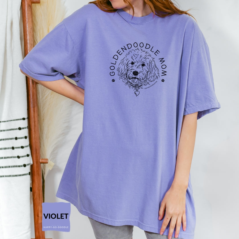 Goldendoodle Mom comfort colors t-shirt with Goldendoodle face and words "Goldendoodle Mom" in violet color