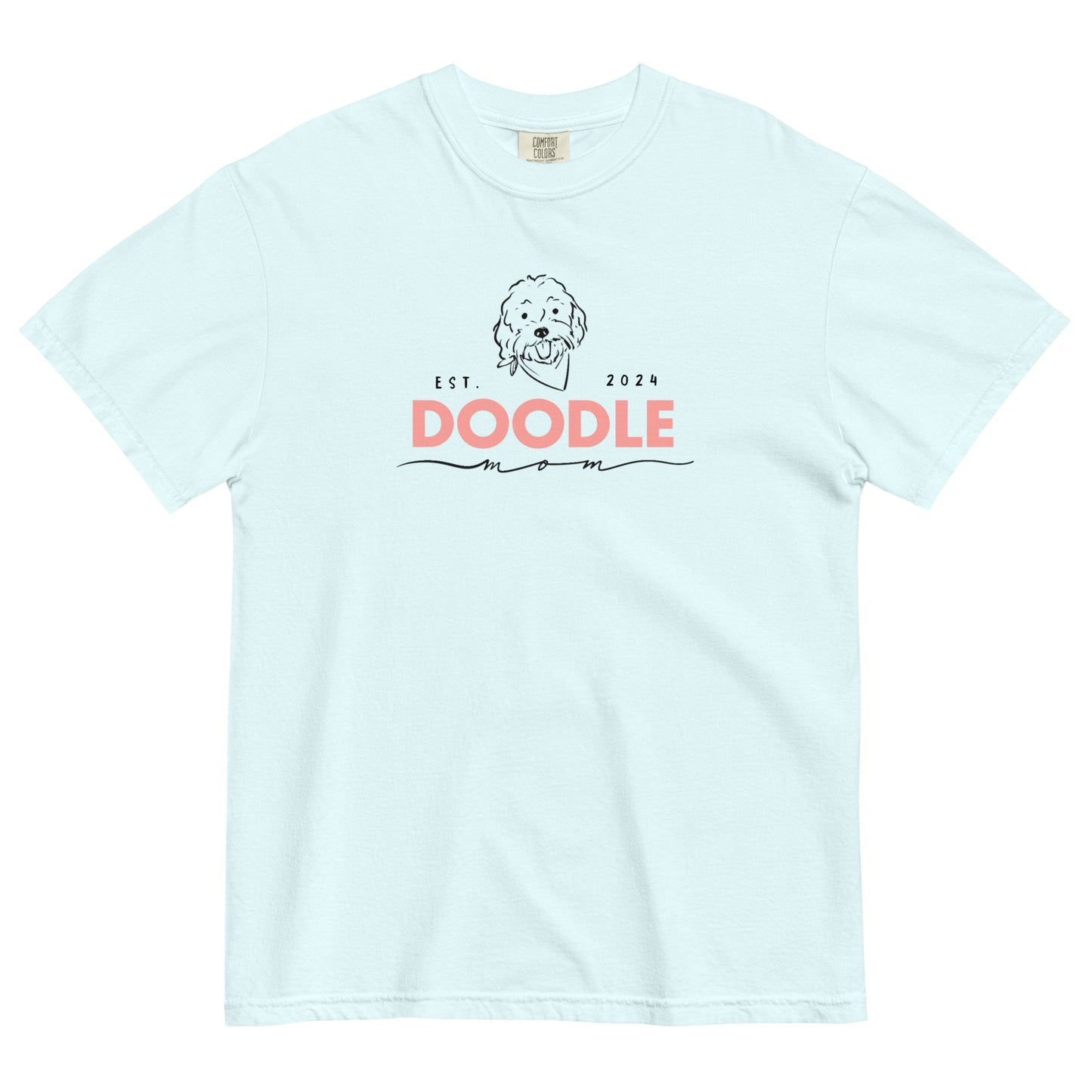 This Goldendoodle shirt displays the words, "Doodle Mom Est. 2024" and a cute Goldendoodle dog's face printed on the front of a cozy T-Shirt. The tag inside the doodle mom shirt says Comfort Colors