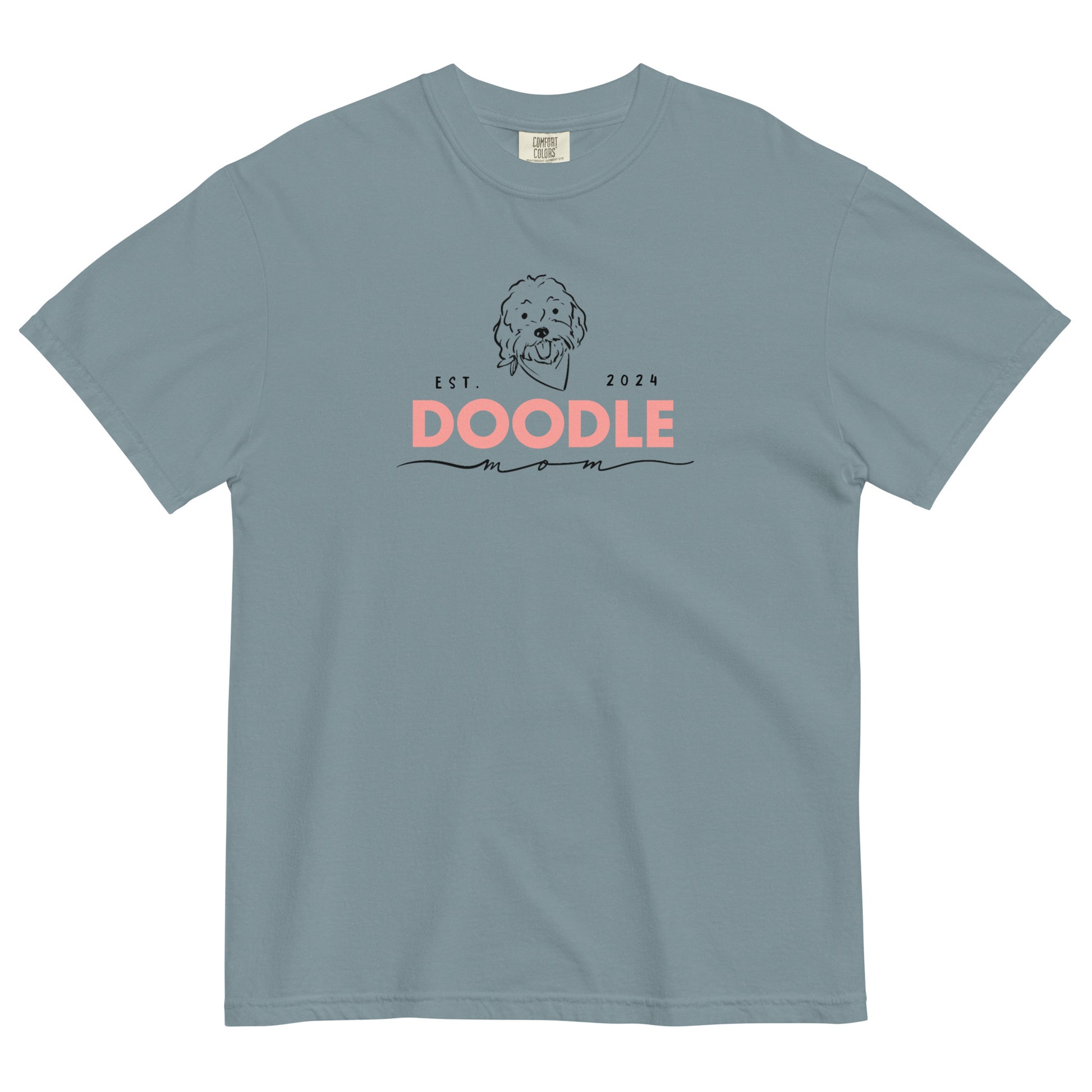 This Doodle Mom shirt features the message, "Doodle Mom Est. 2024" with a cute Doodle dog's face printed on the front of a cozy T-Shirt. The tag inside the shirt says Comfort Colors