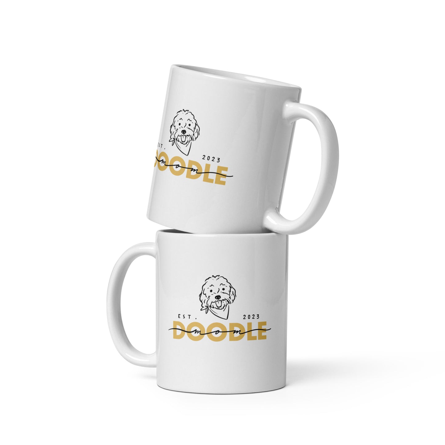 White ceramic coffee mug with cute doodle dog design and words Doodle Mom Est. 2023