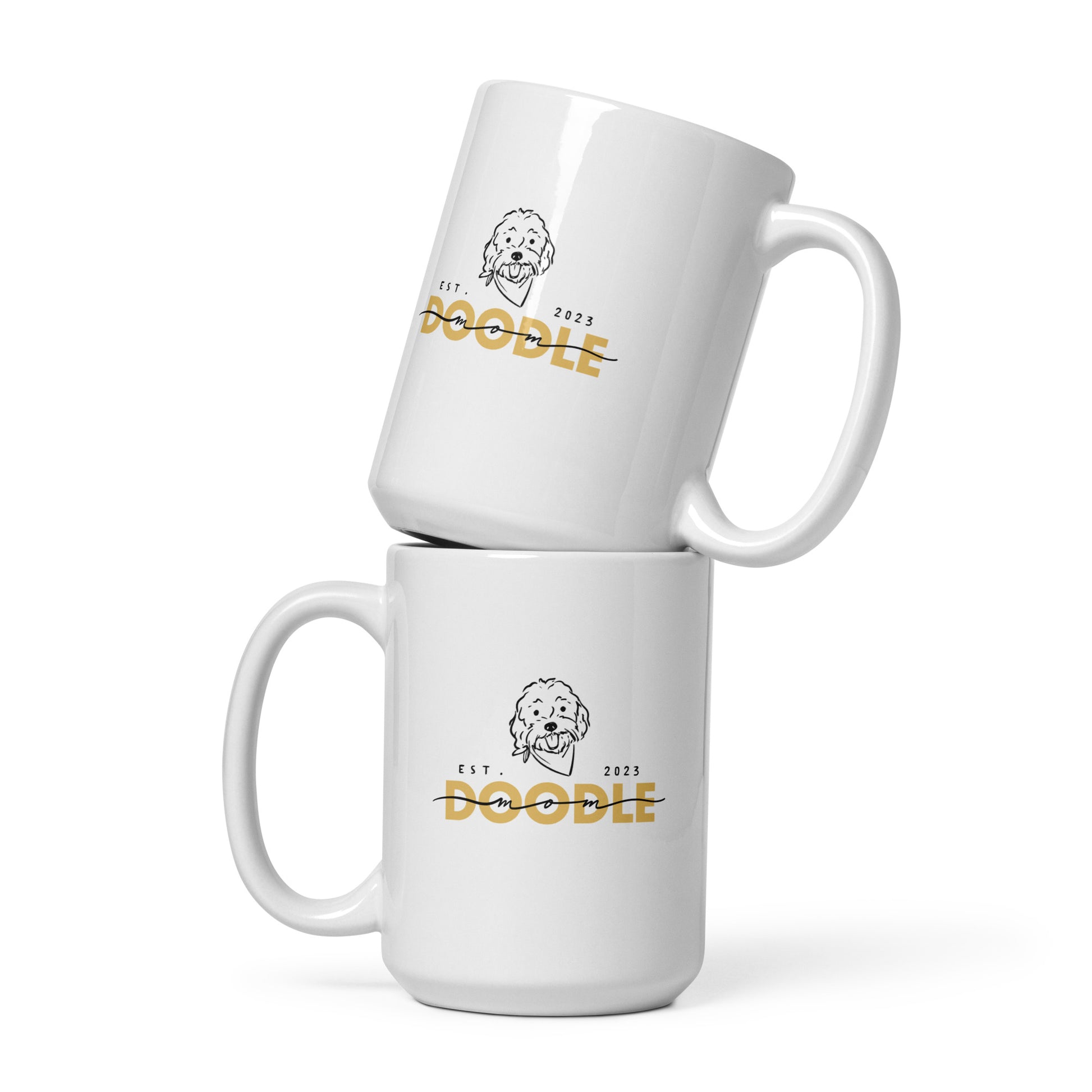 White ceramic coffee mug with cute doodle dog design and words Doodle Mom Est. 2023